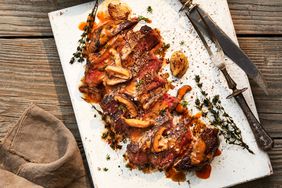 Southern Living Pan-Seared Rib-Eye with Mushroom-Hunter’s Sauce sliced on a platter to serve 