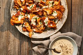 Southern Living Chicken-Fried Mushrooms with Creamy Mushroom Gravy on a platter to serve 