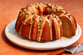 Southern Living Sweet Potato Bundt Cake with Salted-Caramel Glaze on a cake plate to serve 