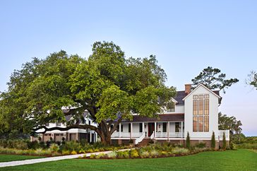 2024 Southern Living Idea House Kiawah River exterior white farmhouse