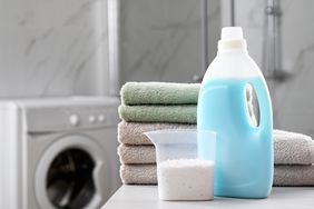 Liquid and Powder Laundry Detergent On Counter