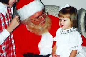 Little girl talking to Santa