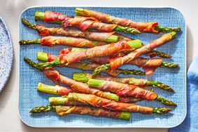 Southern Living Prosciutto Wrapped Asparagus on a platter to serve 