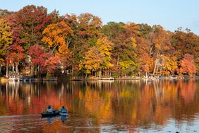 Two people kayaking on Lake Anne in the Fall