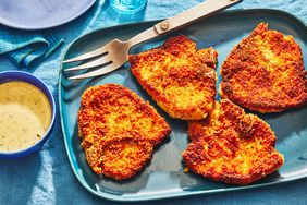 Southern Living Breaded Pork Chops on a platter to serve with sauce