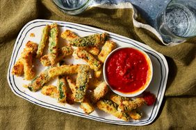 Southern Living Baked Zucchini Fries on a platter to serve with marinara sauce