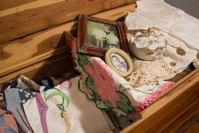 Cedar chest with items inside